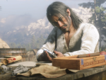 Javier inspects his gun